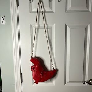 Brand new never used dinosaur T-Rex gold chain mini purse